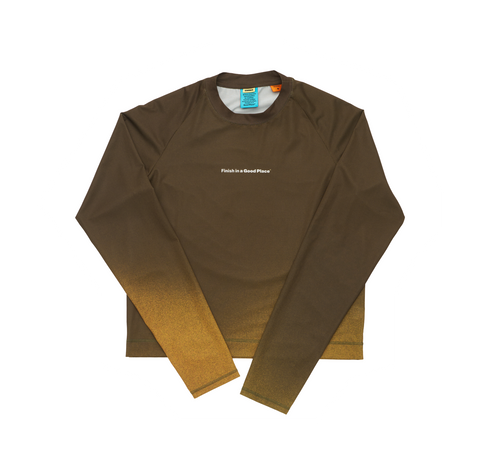 Women's long sleeve Running T-Shirt in Brown/Golden with raglan sleeves. It features a gradient sublimation print shifting to a lighter shade at the bottom. Made from quick-drying, post-consumer recycled polyester with 4-way stretch for great flexibility, ventilation, and breathability. The UNNA "Finish in a Good Place" manifesto is printed on the chest.