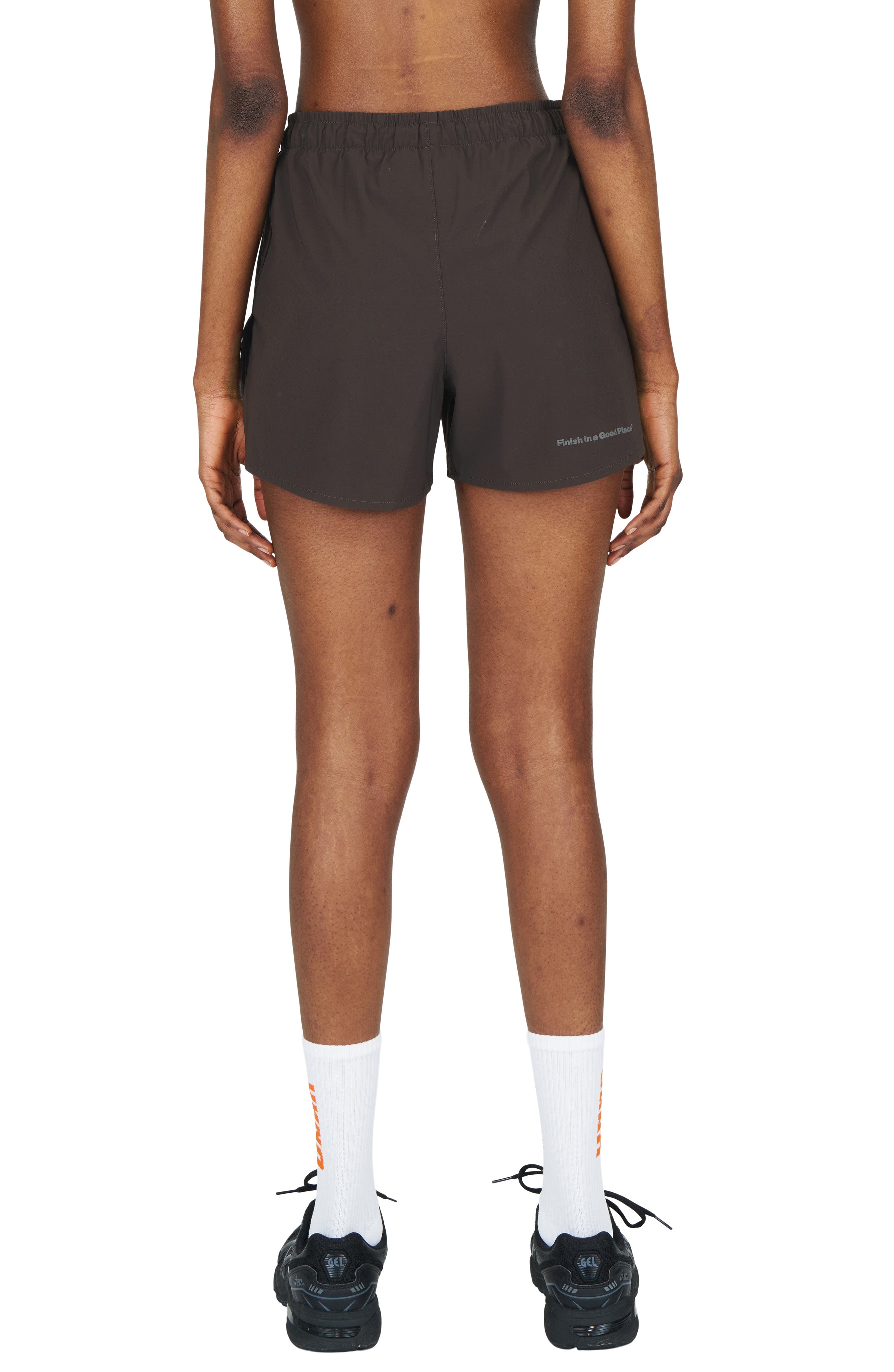Women's running shorts in Java Brown with a soft stretch and side vents. Podium Logo in the front and reflective 