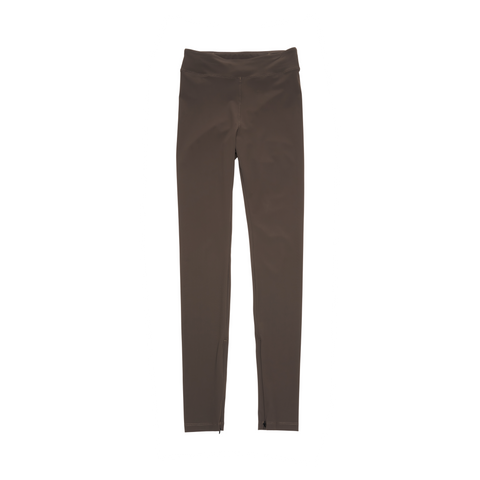 Wren green UNNA tights made in Econyl with zippered ankle slits and smart pockets. Edit alt text