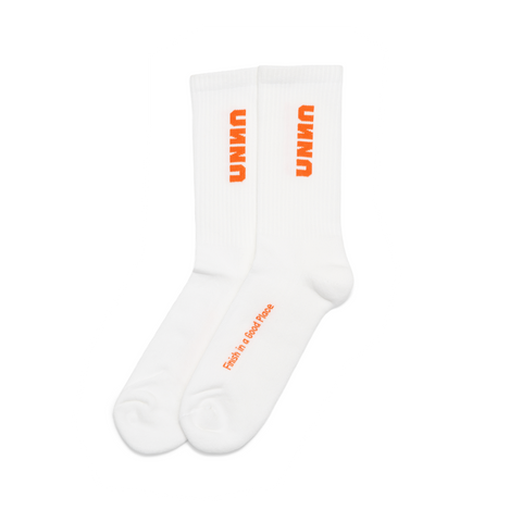 UNNA Miracle socks. Sport socks with stitched UNNA logo and "Finish in a Good Place" manifest.