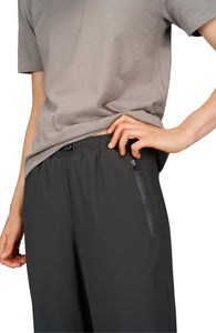 Zippered pockets and adjustable drawstring at waist