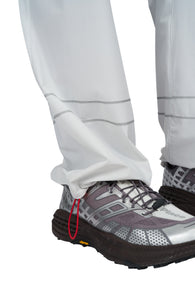 Reflective contrast seams and adjustable drawstrings at leg openings