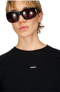 Reflective UNNA logo on the chest