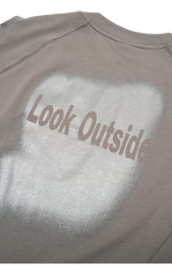 Metallic 'Look Outside' print on the back