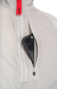 Women's Lightweight (50g/m2) running anorak in Pearl Grey, made in 100% GRS Recycled polyester. Water repellent, packable and with full UV protection. Thumb holes on sleeves and “Finish in a Good Place” patch on the zip.
