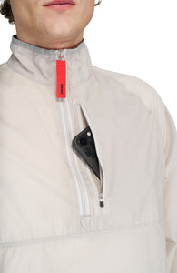 Men's Lightweight (50g/m2) running anorak in Pearl Grey, made in 100% GRS Recycled polyester. Water repellent, packable and with full UV protection. Thumb holes on sleeves and “Finish in a Good Place” patch on the zip.