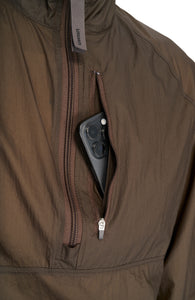 Men's Lightweight (50g/m2) running anorak in Wren Brown, made in 100% GRS Recycled polyester. Water repellent, packable and with full UV protection. Thumb holes on sleeves and “Finish in a Good Place” patch on the zip.