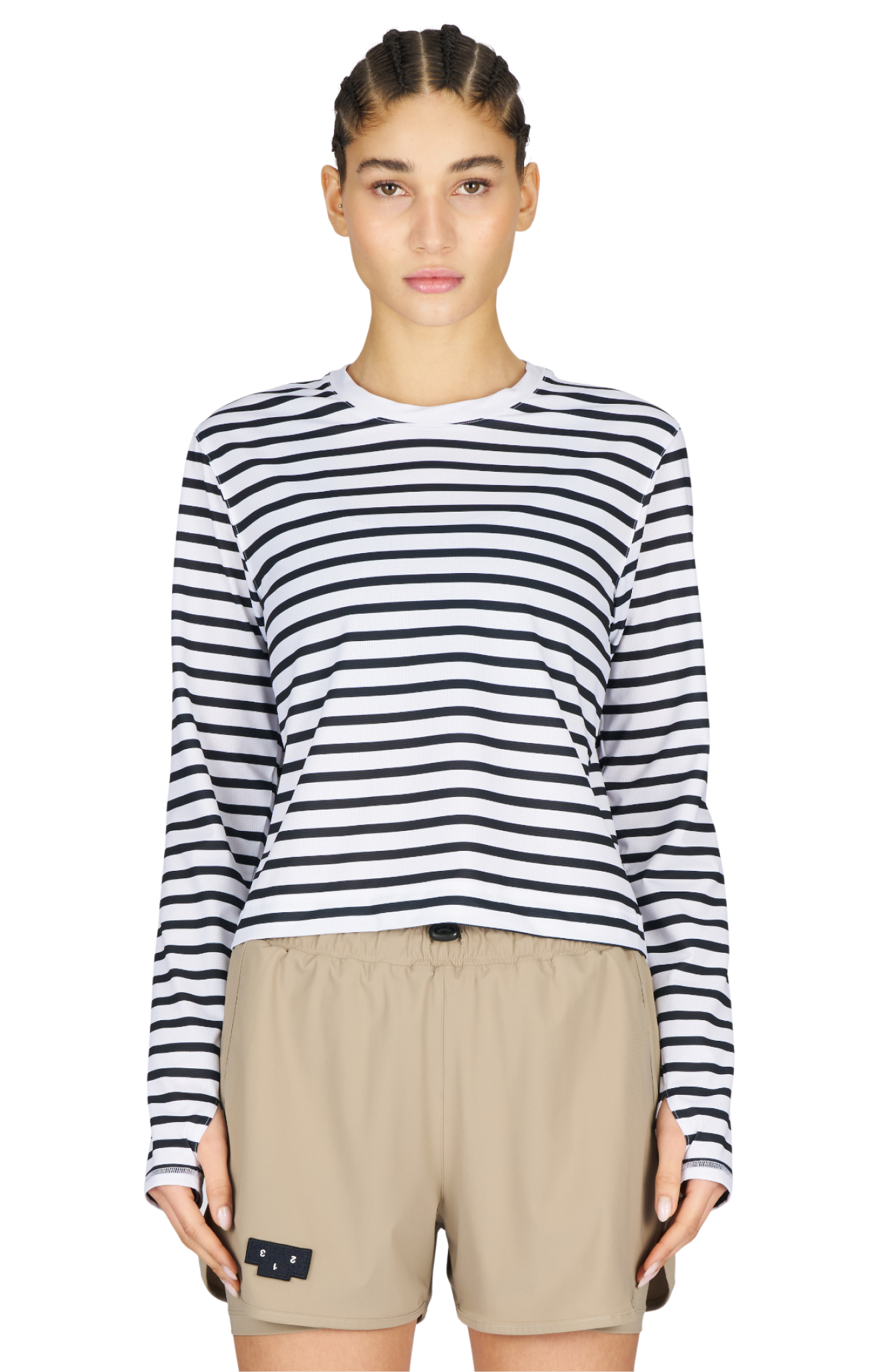 Women’s striped long sleeve Running T-Shirt in White and Navy, featuring raglan sleeves with thumbholes. It has a water-based sublimation-printed stripe pattern and is made from quick-drying, post-consumer recycled polyester with 4-way stretch for flexibility, ventilation, and breathability. A bold, hand-drawn UNNA text on the back.