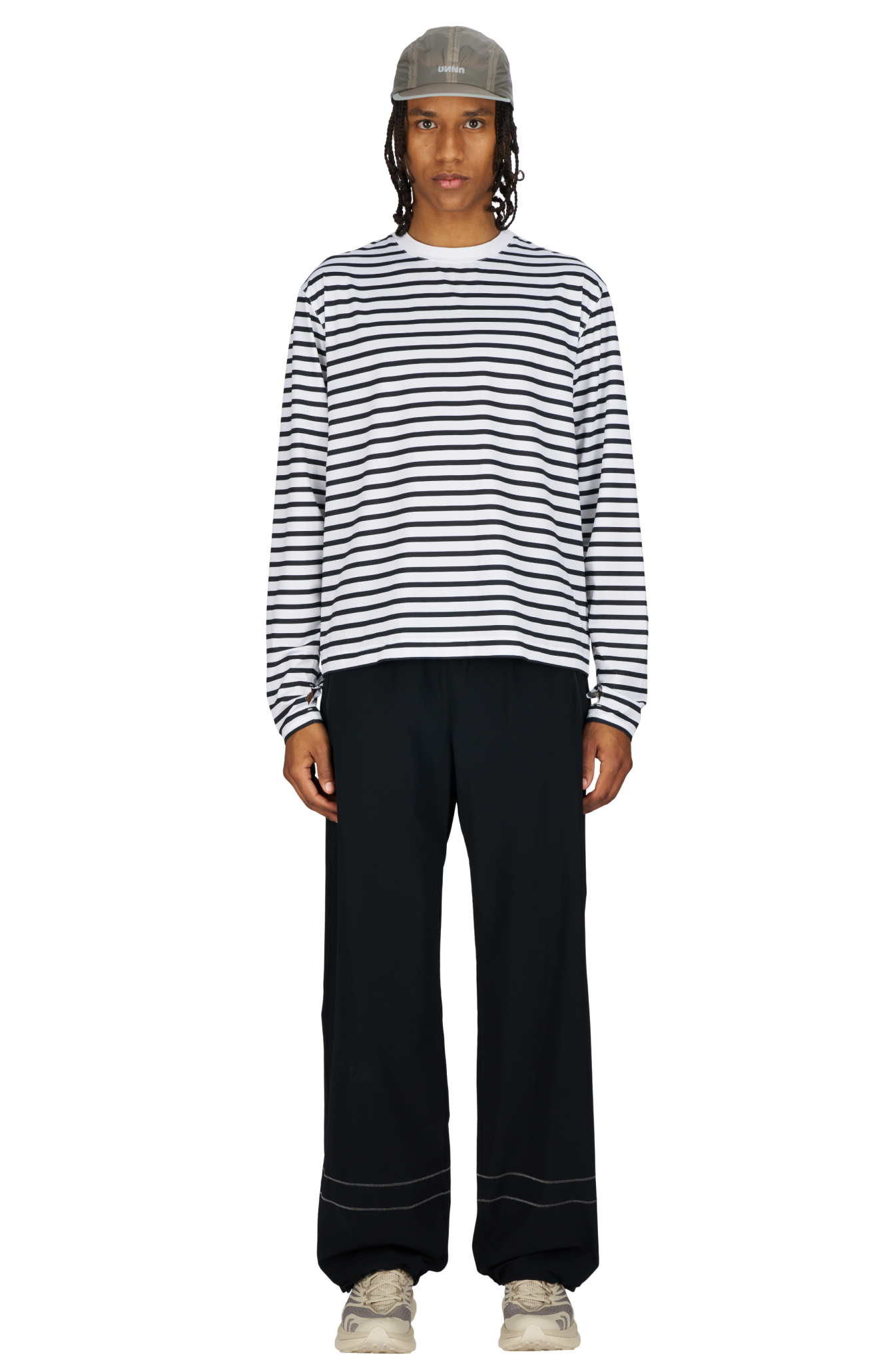 Men’s striped long sleeve Running T-Shirt in White and Navy, featuring raglan sleeves with thumbholes. It has a water-based sublimation-printed stripe pattern and is made from quick-drying, post-consumer recycled polyester with 4-way stretch for flexibility, ventilation, and breathability. A bold, hand-drawn UNNA text on the back.