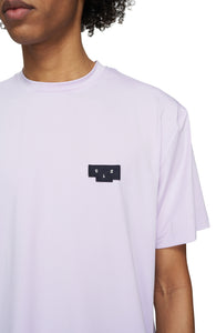 Men's T-shirt in Dusty Orchid with a regular fit and white contrast seams. Made in an Italian lightweight fabric that has great absorbing quality and dries quickly. Patch with UNNA upside-down Podium Logo on the chest.