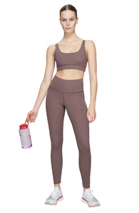 Sports bra in Plum Grey with comfortable support, removable padding and adjustable strap. UNNA logo on the back. Made in Econyl.