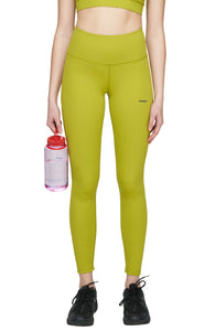 Light compression tights in Golden Green with smart pockets for your phone, airpods, and what not. UNNA logo on the front leg and "Finish in a Good Place" on the back. 