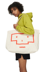 Unna Podium Bag in natural canvas with upside down Podium Logo in red and UNNA manifesto.