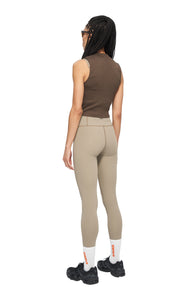 UNNA Good Place tights in stone beige with a phone pocket and UNNA logo in the back.