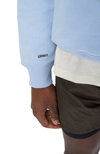 Serenity blue sweatshirt with embroidered UNNA logo on sleeve - UNNA Slow Motion Sweatshirt