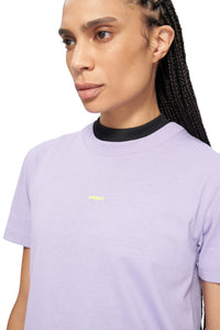 Women's lilac purple t-shirt with a screen printed UNNA logo at the chest. 