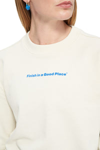 Vanilla white, vintage feel sweatshirt with "Finish in a Good Place" printed on chest - UNNA Slow Motion Sweatshirt