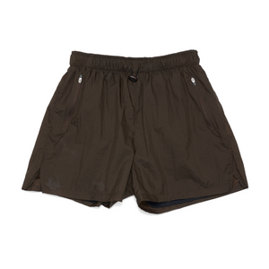 Wren green running shorts in lightweight, water repellent, recycled polyester - UNNA